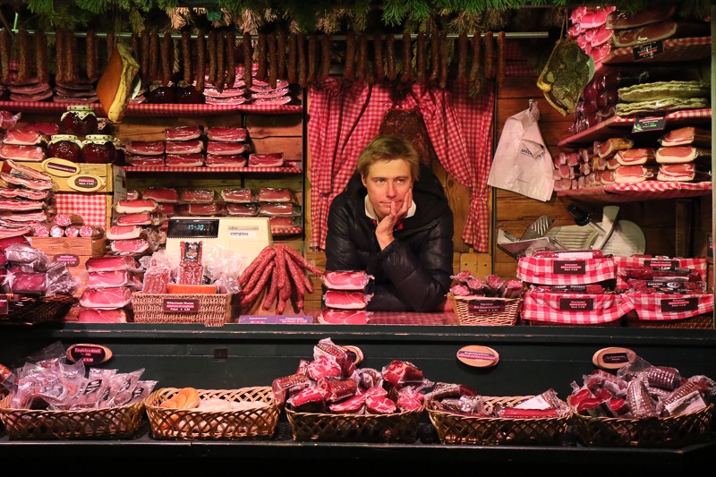 Christmas market meat seller, Innsbruck, Austria
